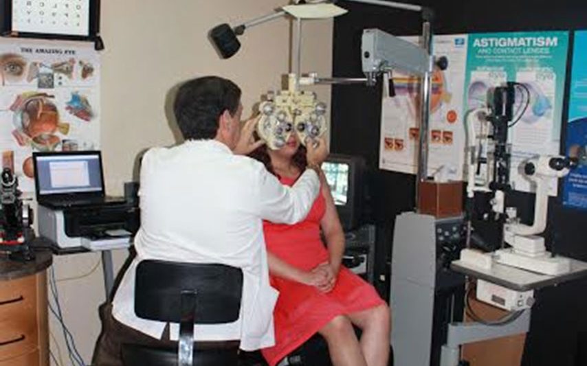woman receiving eye exam in exam room